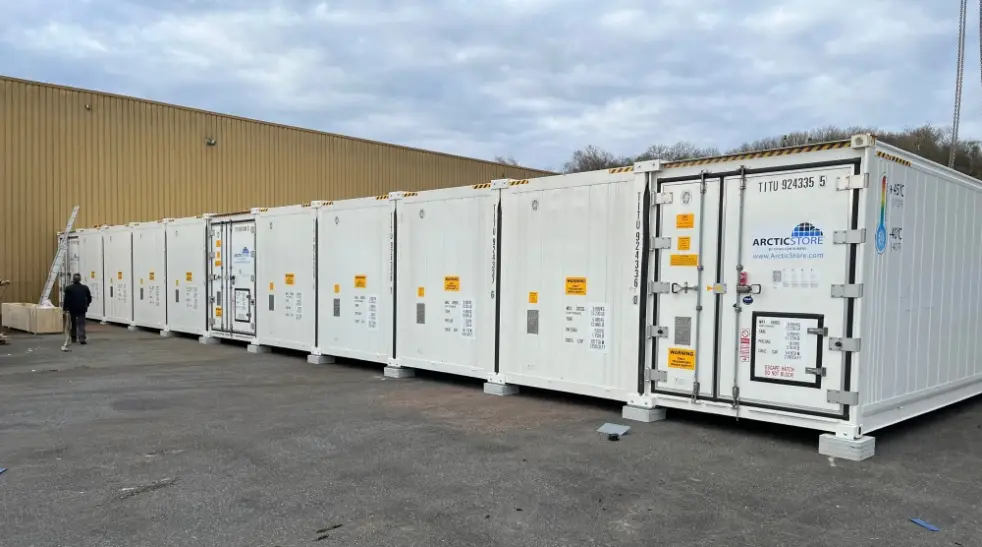 Modular cold storage container installation forming a SuperStore unit